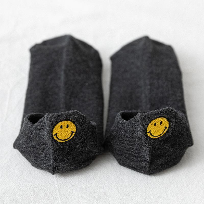 Süße lächelnde Socken